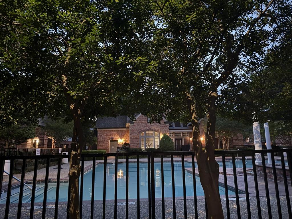 2524 Preston Road, Unit 1205 Plano, TX 75093 - Photo 25 of 31 Pool view from the patio in the evening