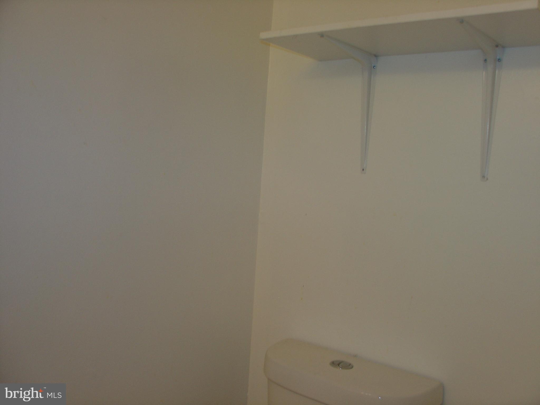8619 Ritchboro Road District Heights, MD 20747 - Photo 22 of 24 Lower Level Powder Room