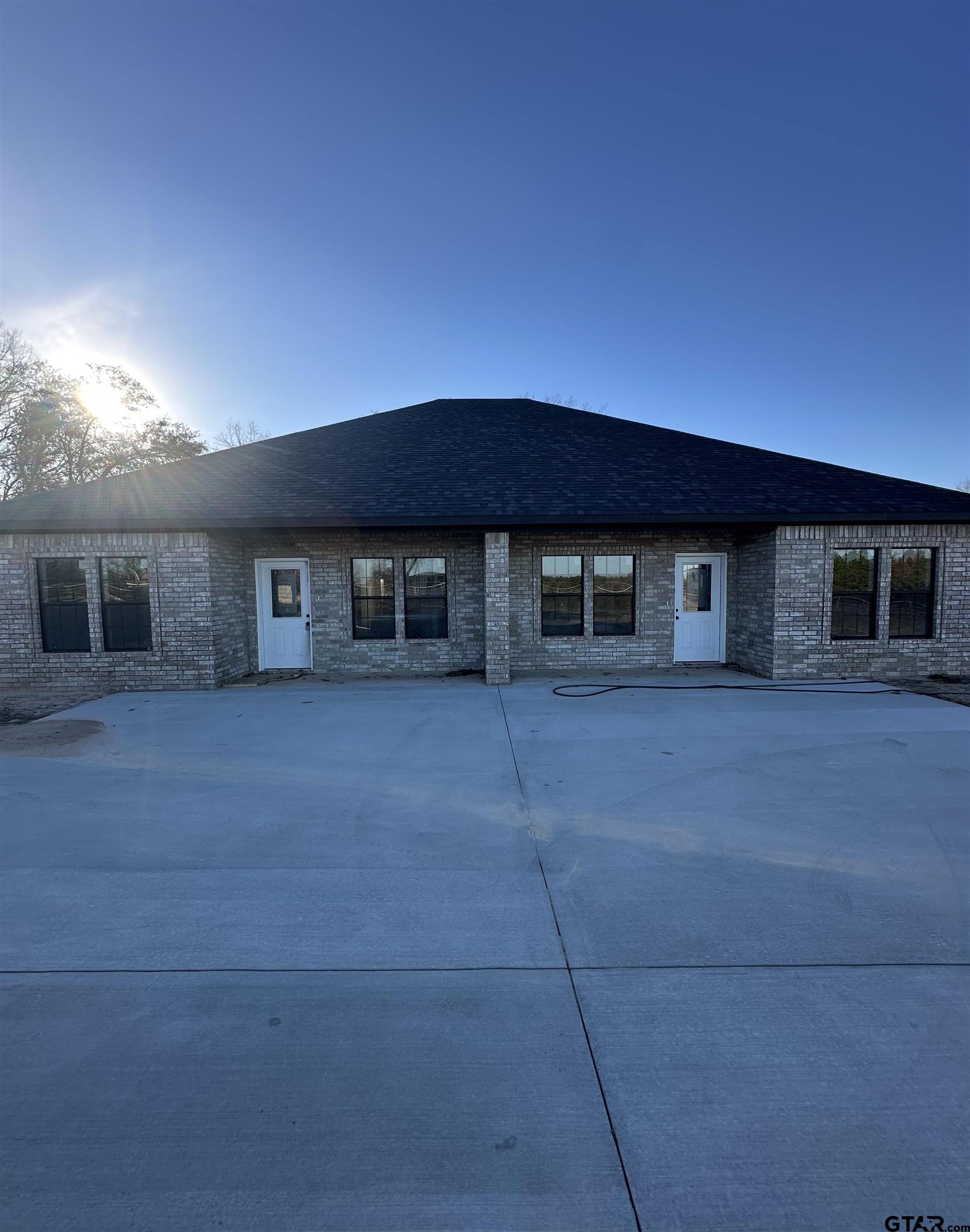 9839 County Road 35 Tyler, TX 75706 - Photo 1 of 12 a house view with a garden space