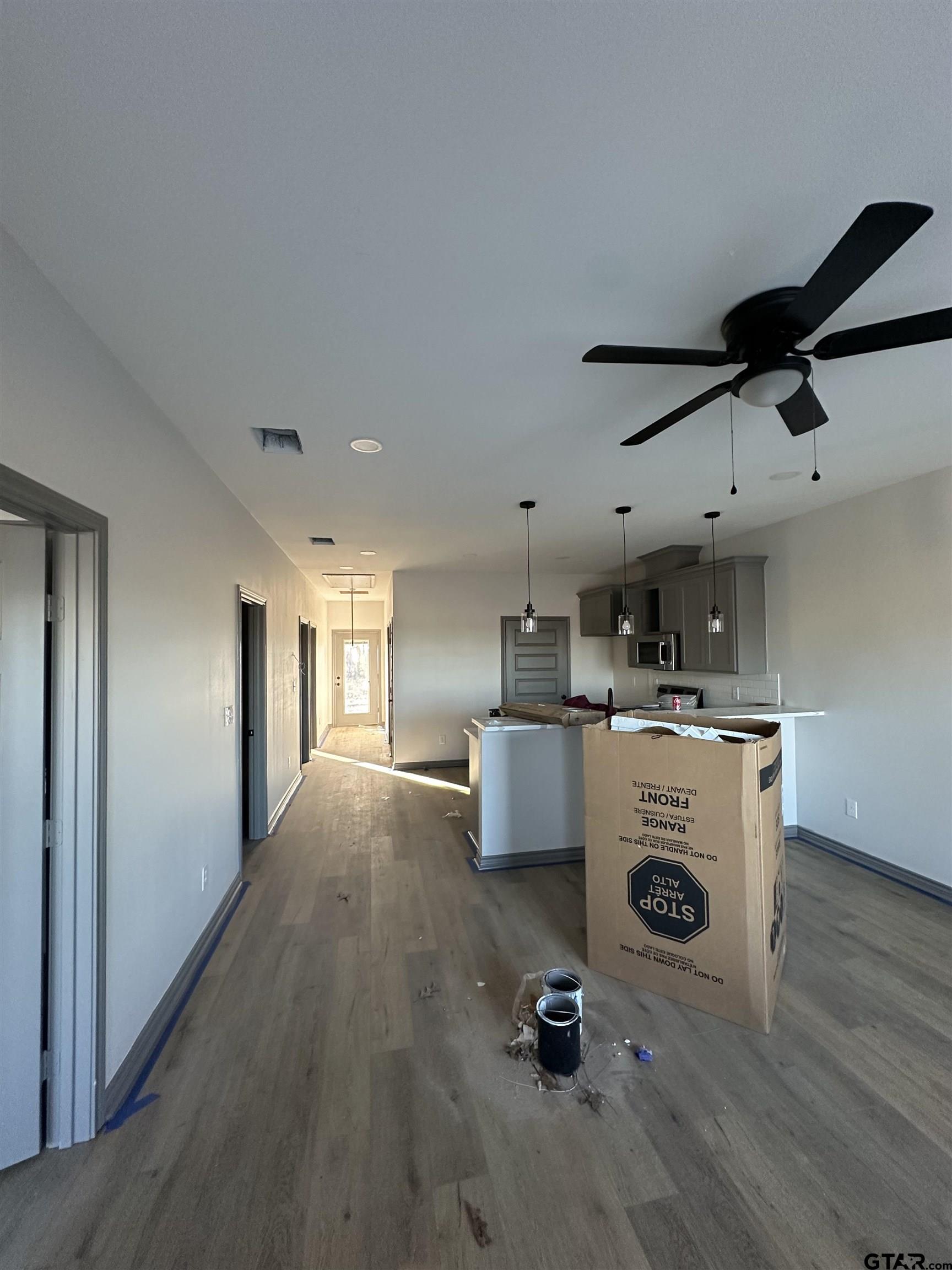 9839 County Road 35 Tyler, TX 75706 - Photo 2 of 12 a view of kitchen and living room