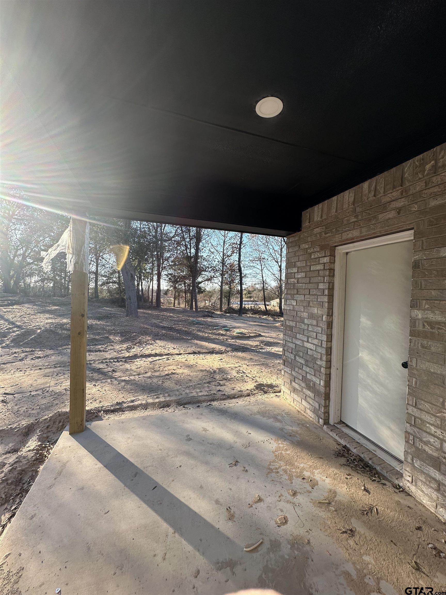 9839 County Road 35 Tyler, TX 75706 - Photo 7 of 12 a view of an empty room and window