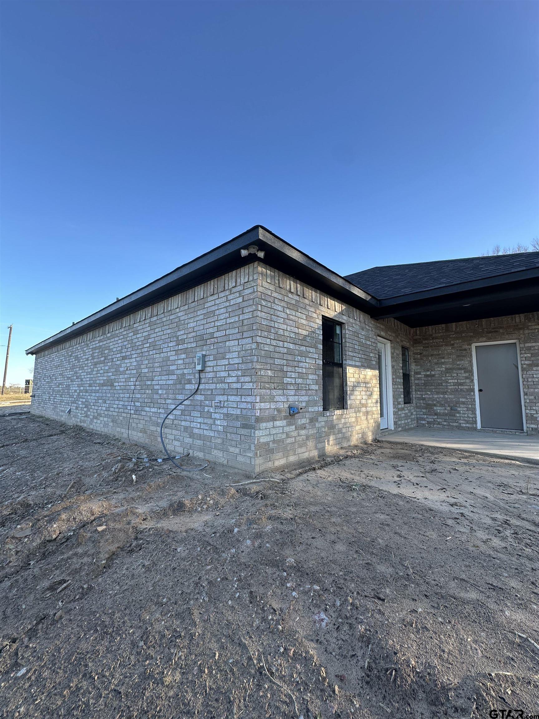 9839 County Road 35 Tyler, TX 75706 - Photo 10 of 12 a view of a house with backyard