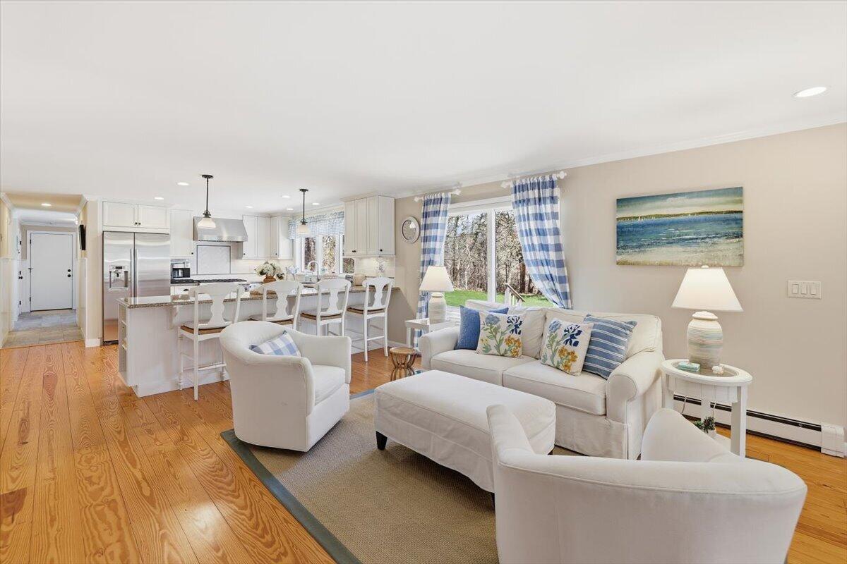 60 Harbor Hill Road Chatham, MA 02633 - Photo 13 of 47 a living room with furniture and a wooden floor