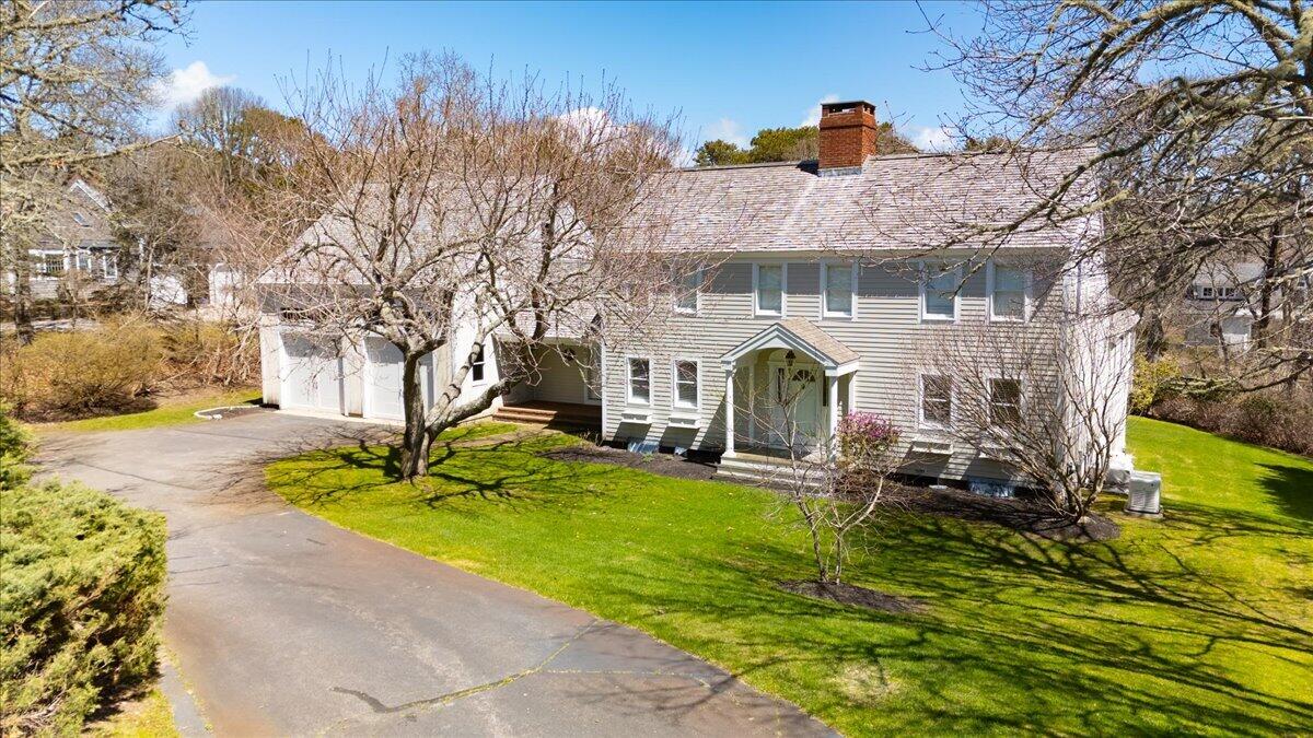 60 Harbor Hill Road Chatham, MA 02633 - Photo 3 of 47 a view of a house with a yard
