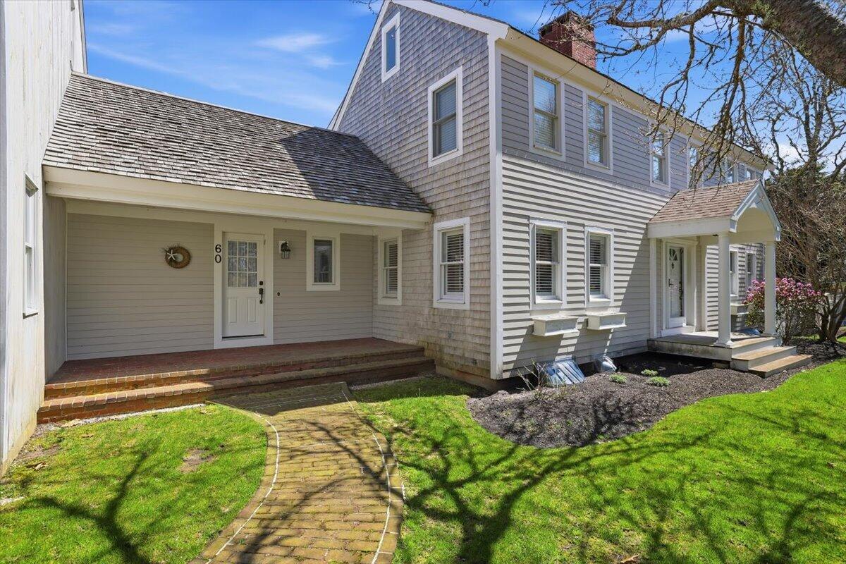 60 Harbor Hill Road Chatham, MA 02633 - Photo 31 of 47 a view of a house with backyard and garden