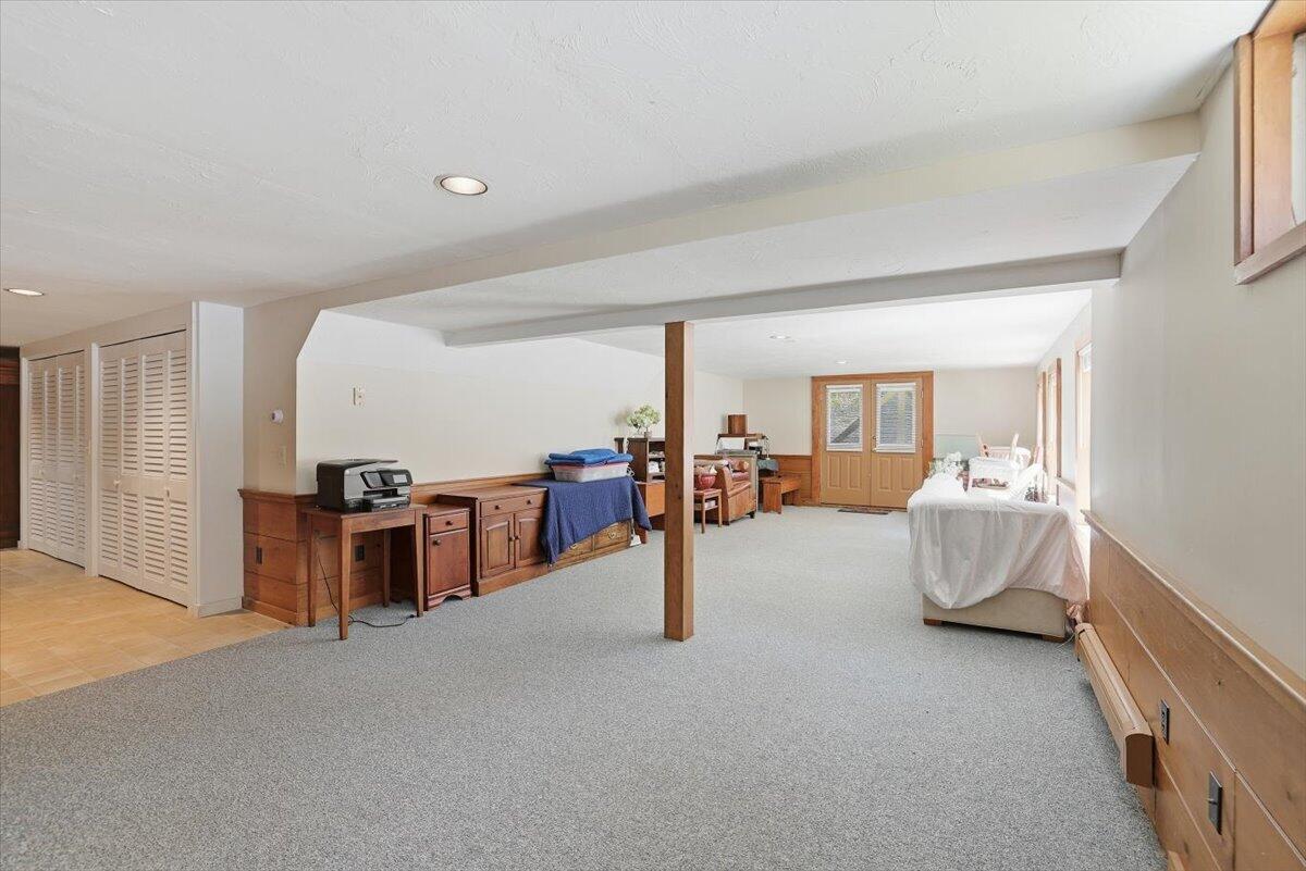 60 Harbor Hill Road Chatham, MA 02633 - Photo 34 of 47 a living room with furniture and a flat screen tv
