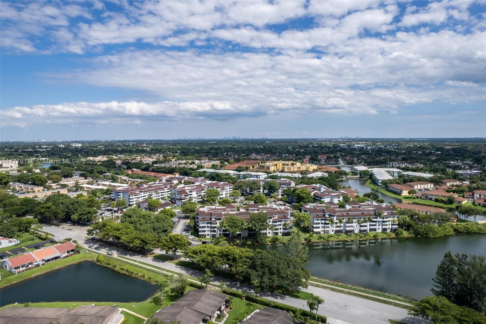 8335 Southwest 152nd Avenue, Unit B106 Miami, FL 33193 - Photo 26 of 27 an aerial view of residential houses with outdoor space