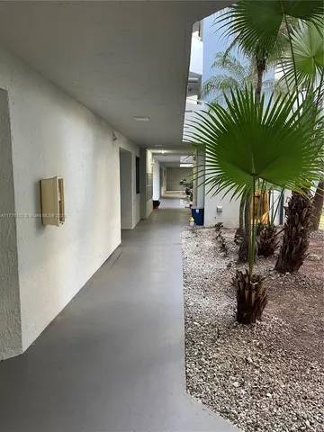 a vase of flowers sitting on a table