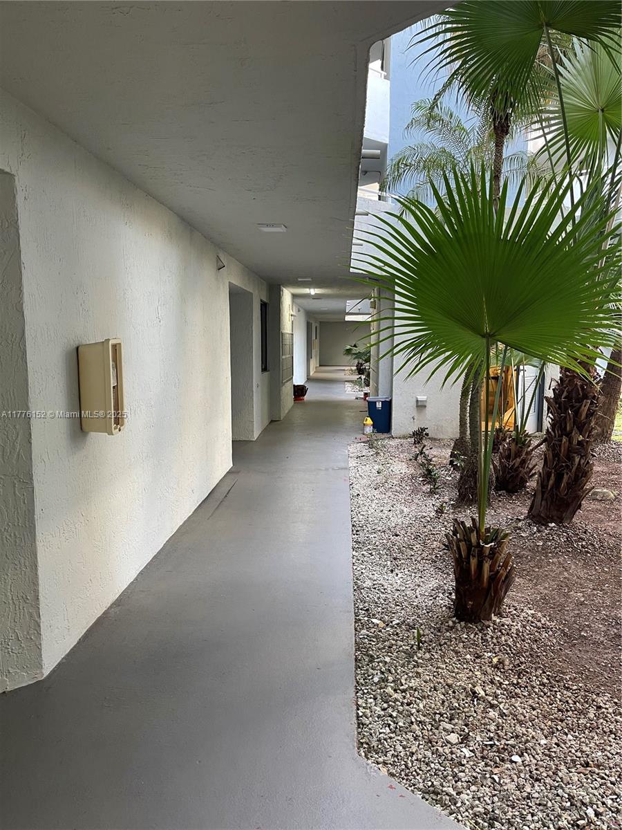 8335 Southwest 152nd Avenue, Unit B106 Miami, FL 33193 - Photo 5 of 27 a view of a house with a patio