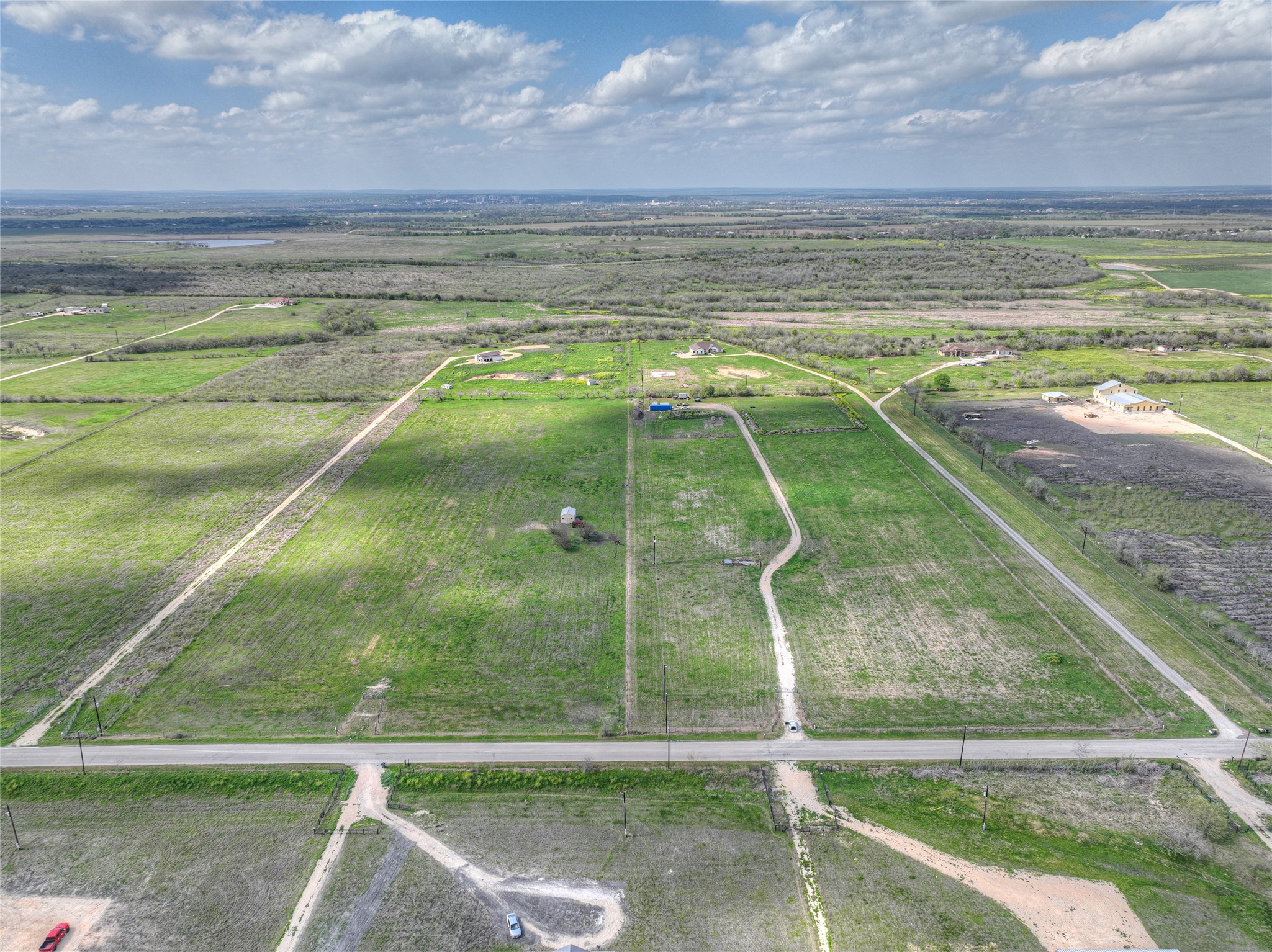1492 Scull Road San Marcos, TX 78666 - Photo 3 of 10 Aerial view of sparsely populated area with abundant farmland