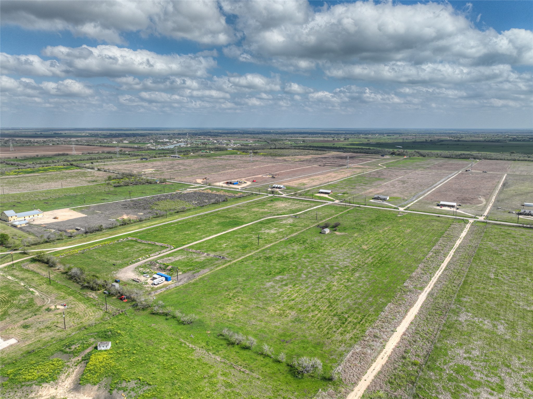 1492 Scull Road San Marcos, TX 78666 - Photo 5 of 10 Aerial view of sparsely populated area with large plots for crops