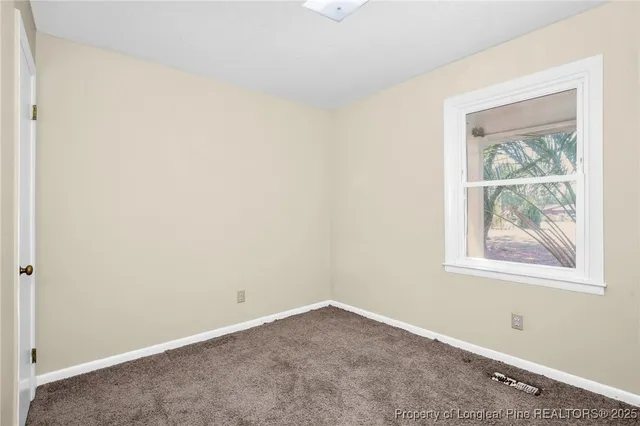 an empty room with a window