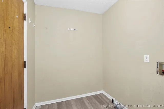 a view of small space with wooden floor