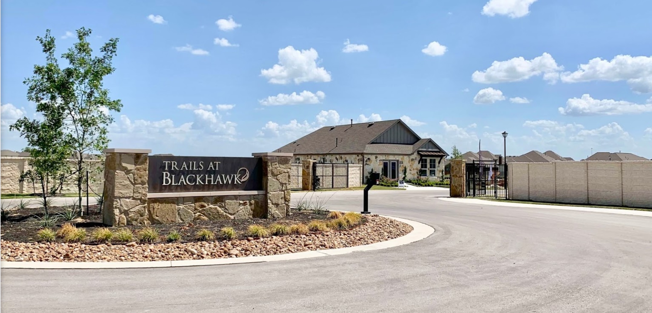 3908 Birdwatch Loop, Unit 56 Pflugerville, TX 78660 - Photo 2 of 30 a front view of a house with a yard and garage