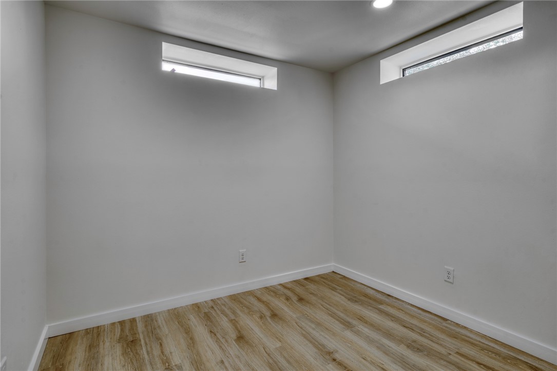 1513 Wolf Run College Station, TX 77840 - Photo 13 of 33 Office with healthy amount of natural light and wood finished floors