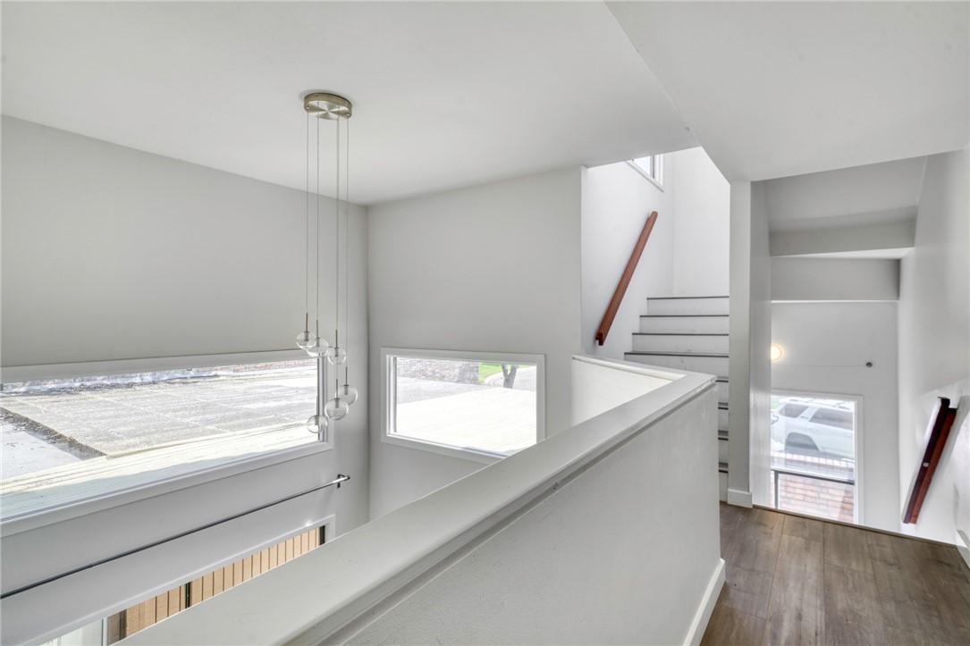 1513 Wolf Run College Station, TX 77840 - Photo 15 of 33 Corridor featuring dark wood-type flooring