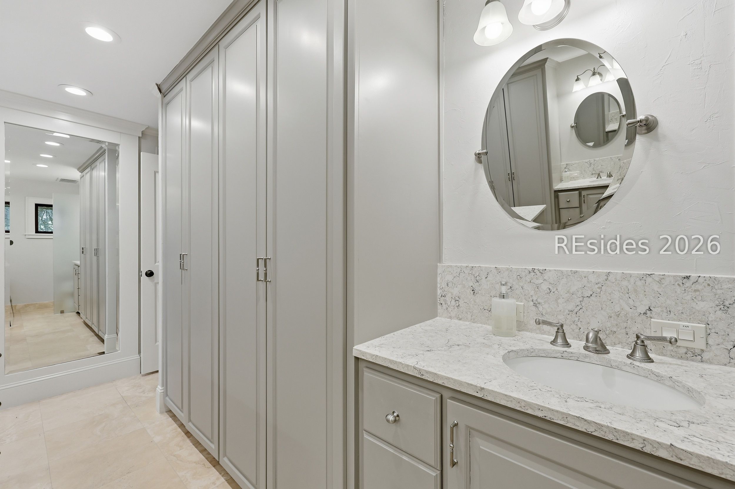 28 Pine Island Road Hilton Head Island, SC 29928 - Photo 32 of 84 PRIMARY BATH - CUSTOM STORAGE + VANITY