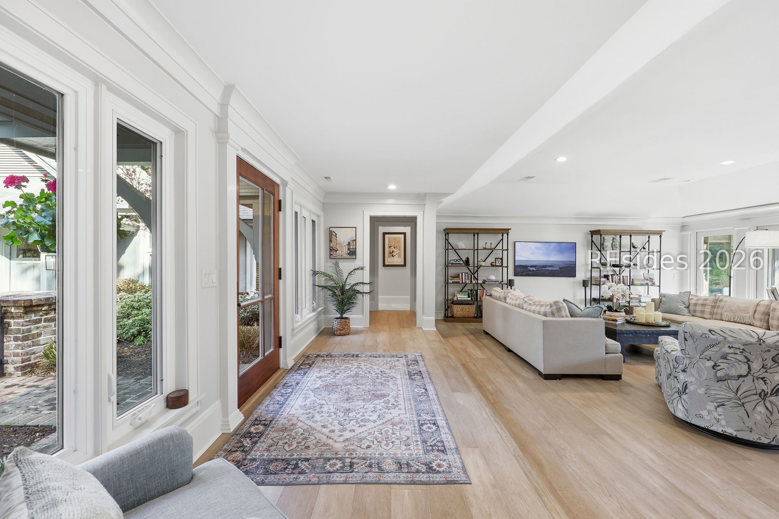 28 Pine Island Road Hilton Head Island, SC 29928 - Photo 6 of 84 GRAND FOYER WITH WALL of WINDOWS + GREAT ROOM VIEW