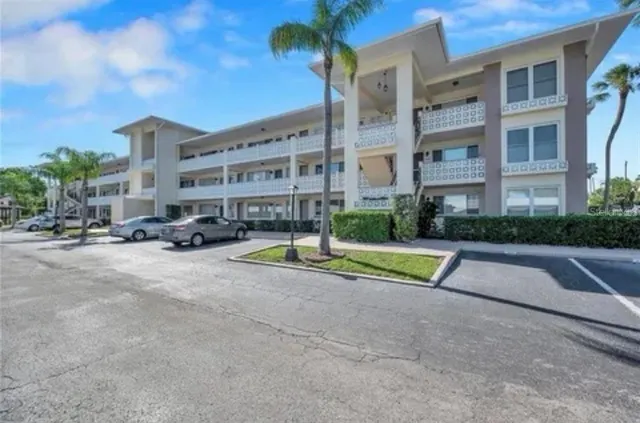 a view of street with tall buildings