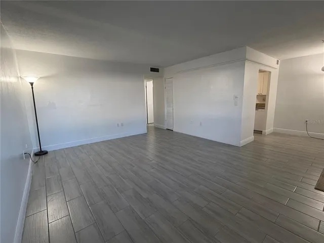 a kitchen with a sink a cabinets and window