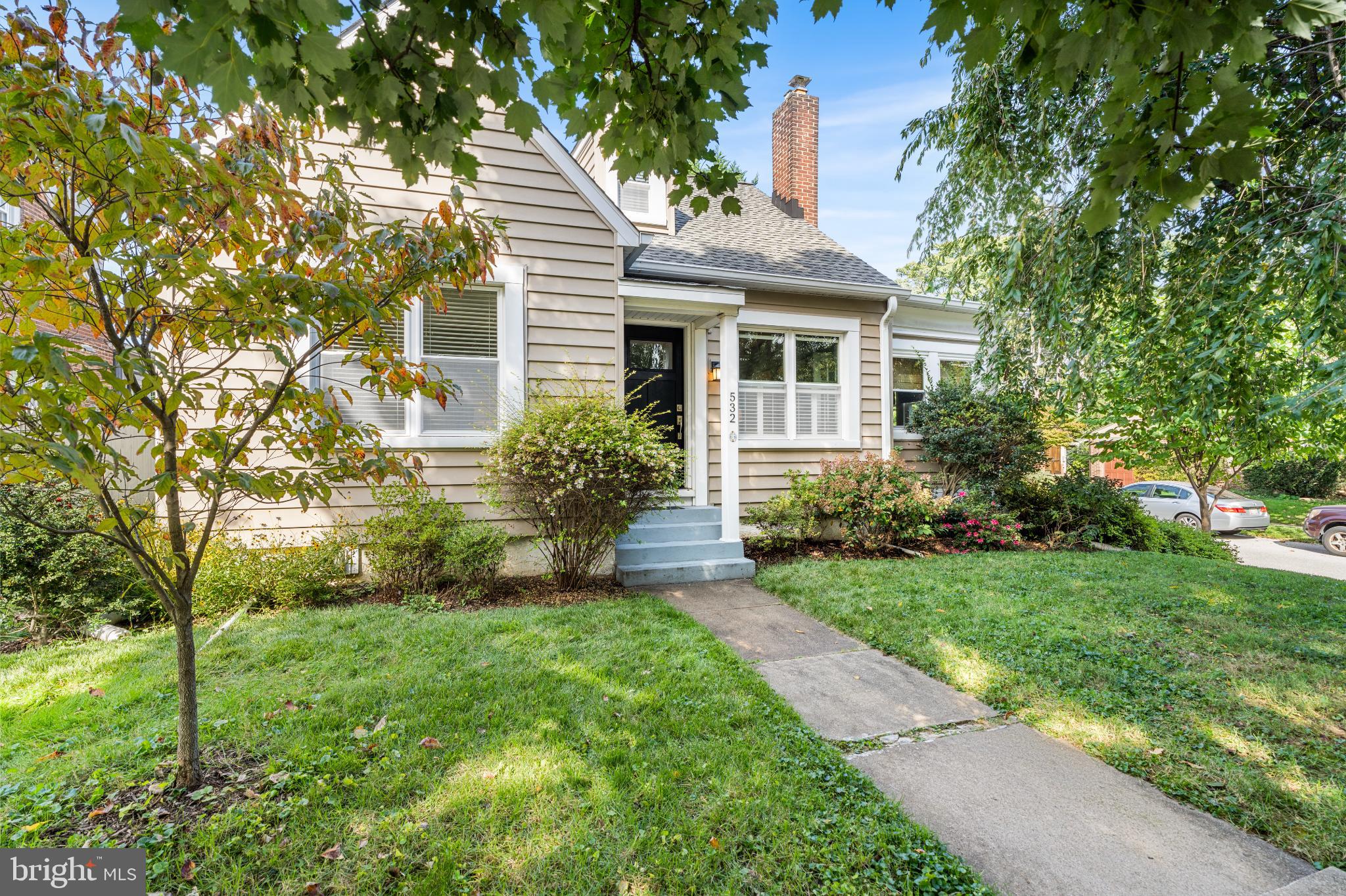 532 Overbrook Road Baltimore, MD 21212 - Photo 2 of 44 a front view of a house with a yard and potted plants