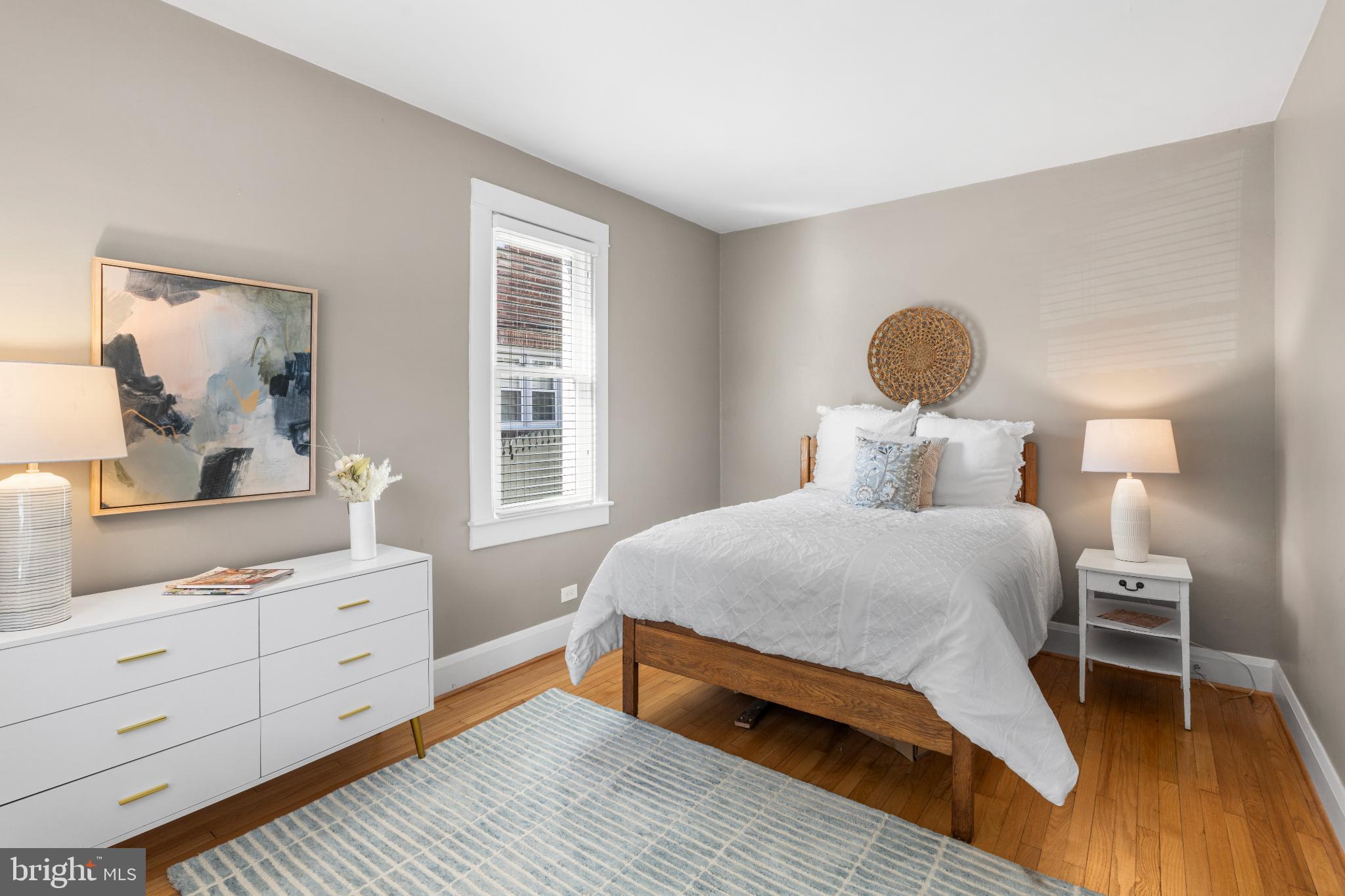 532 Overbrook Road Baltimore, MD 21212 - Photo 21 of 44 a bedroom with a bed and a dresser