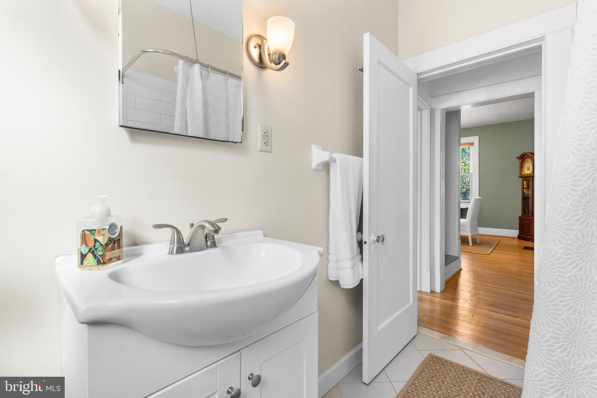 532 Overbrook Road Baltimore, MD 21212 - Photo 25 of 44 a bathroom with a sink and a mirror