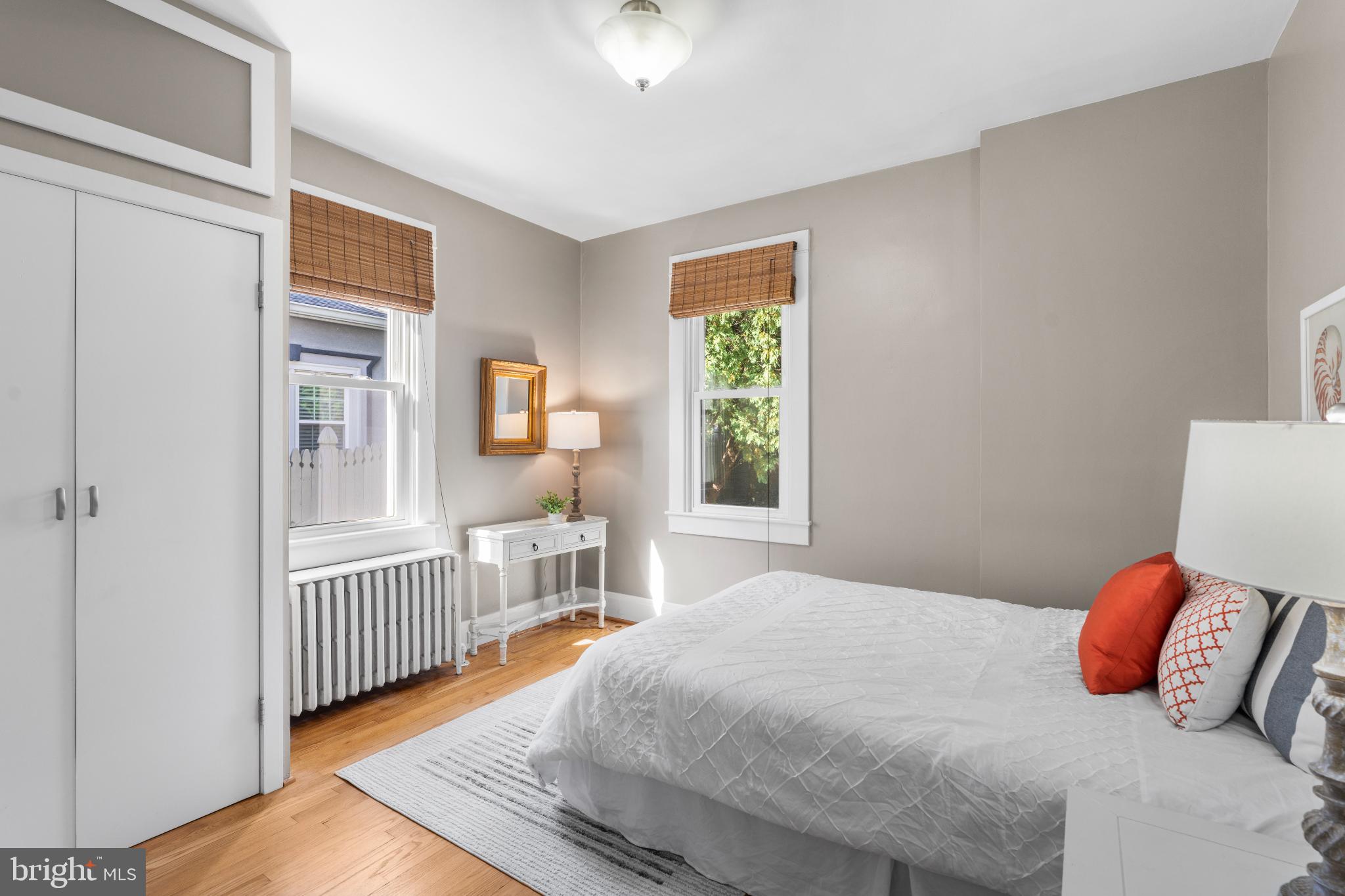 532 Overbrook Road Baltimore, MD 21212 - Photo 26 of 44 a bedroom with a bed and wooden floor