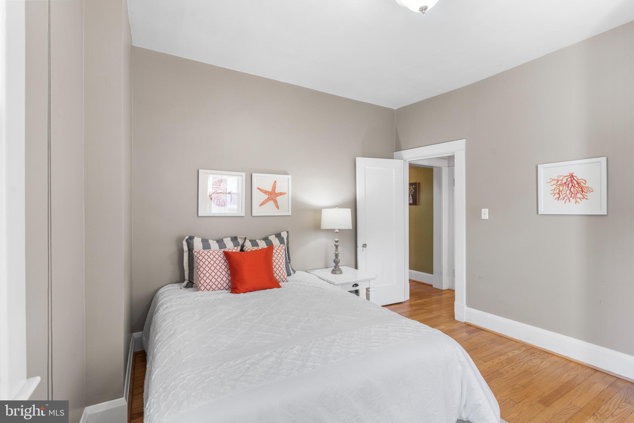 532 Overbrook Road Baltimore, MD 21212 - Photo 27 of 44 a bedroom with a bed and lamp