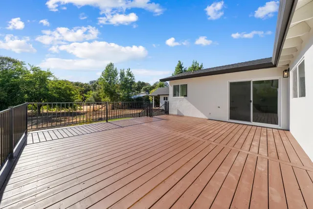 a view of outdoor space with wooden deck