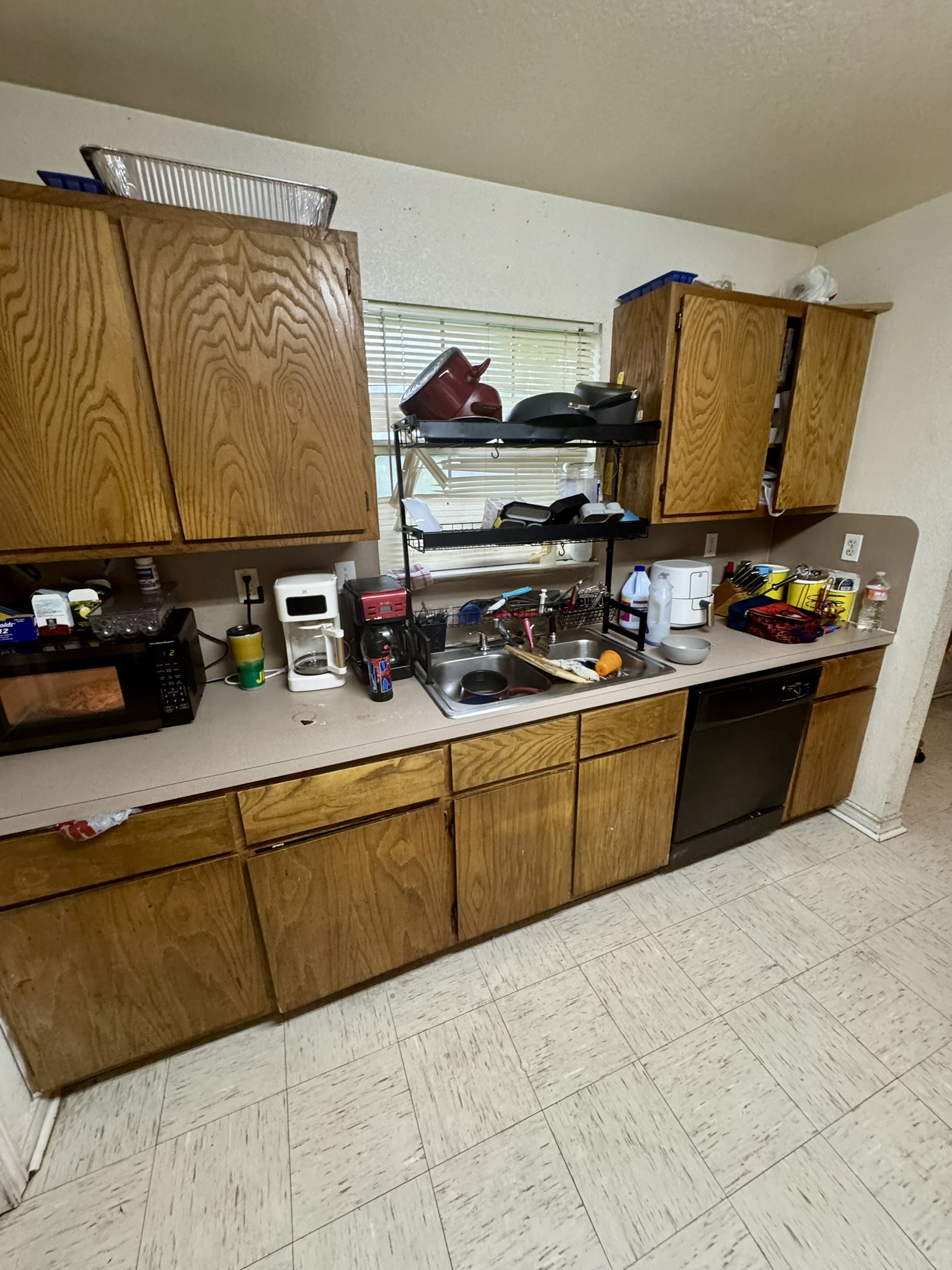 9 South 19th Street Temple, TX 76504 - Photo 4 of 11 a kitchen with stainless steel appliances a sink and cabinets