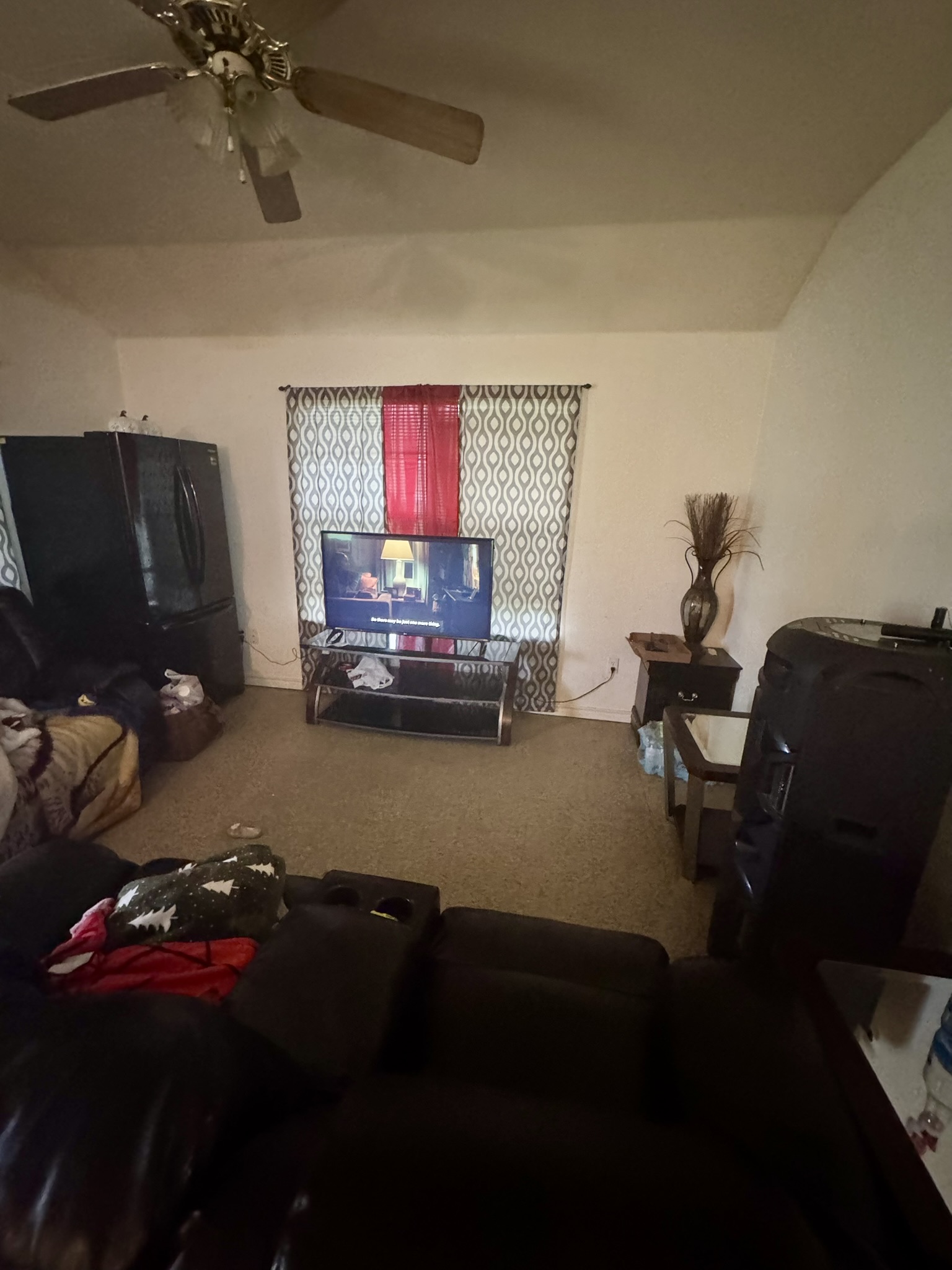 9 South 19th Street Temple, TX 76504 - Photo 5 of 11 a room with furniture and a flat screen tv