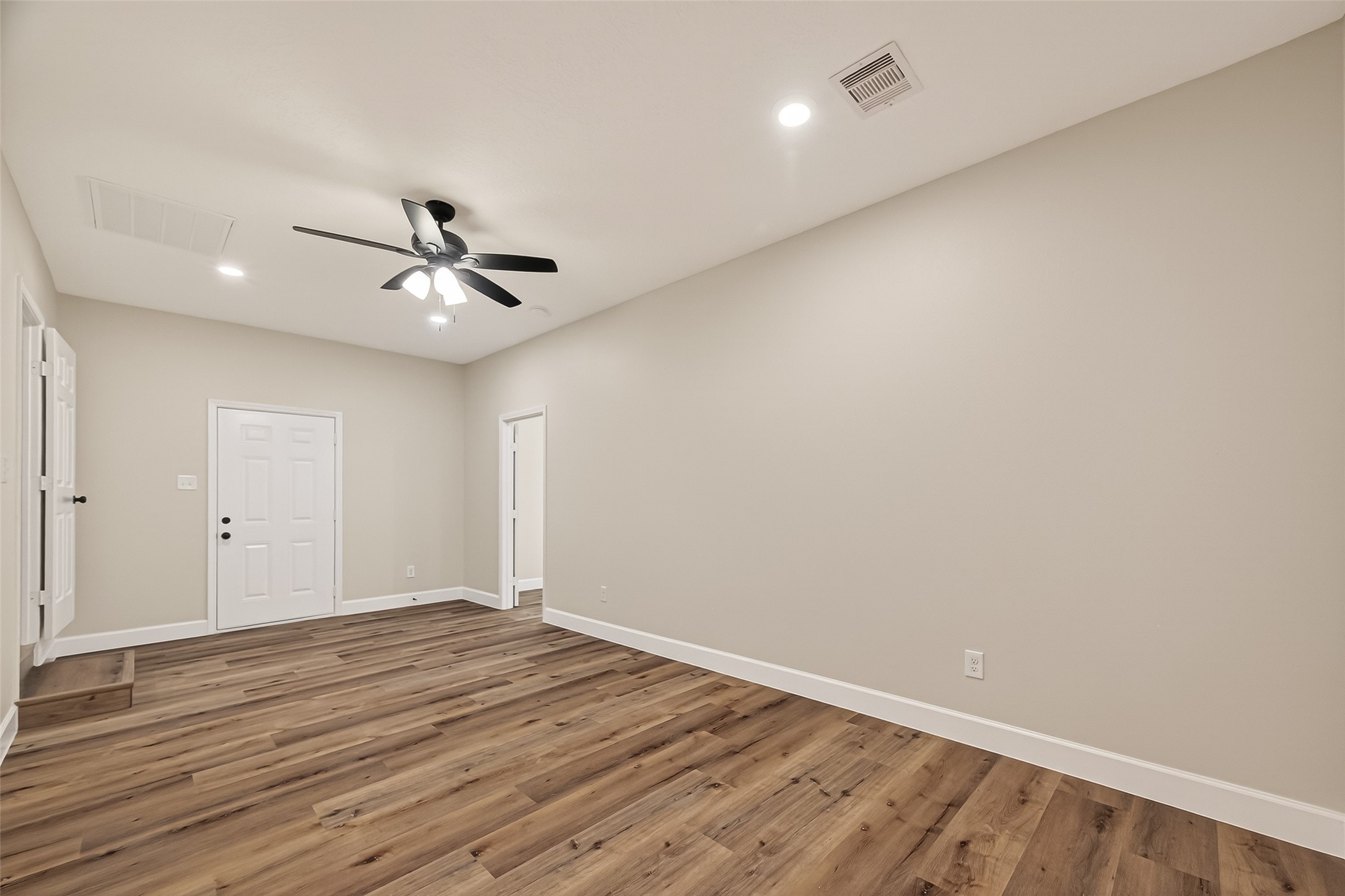 917 South Main Street Highlands, TX 77562 - Photo 25 of 45 wooden floor in an empty room