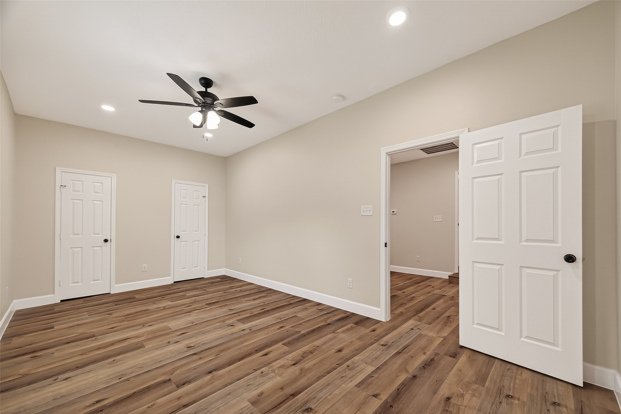 917 South Main Street Highlands, TX 77562 - Photo 28 of 45 a view of room with wooden floor and ceiling fan