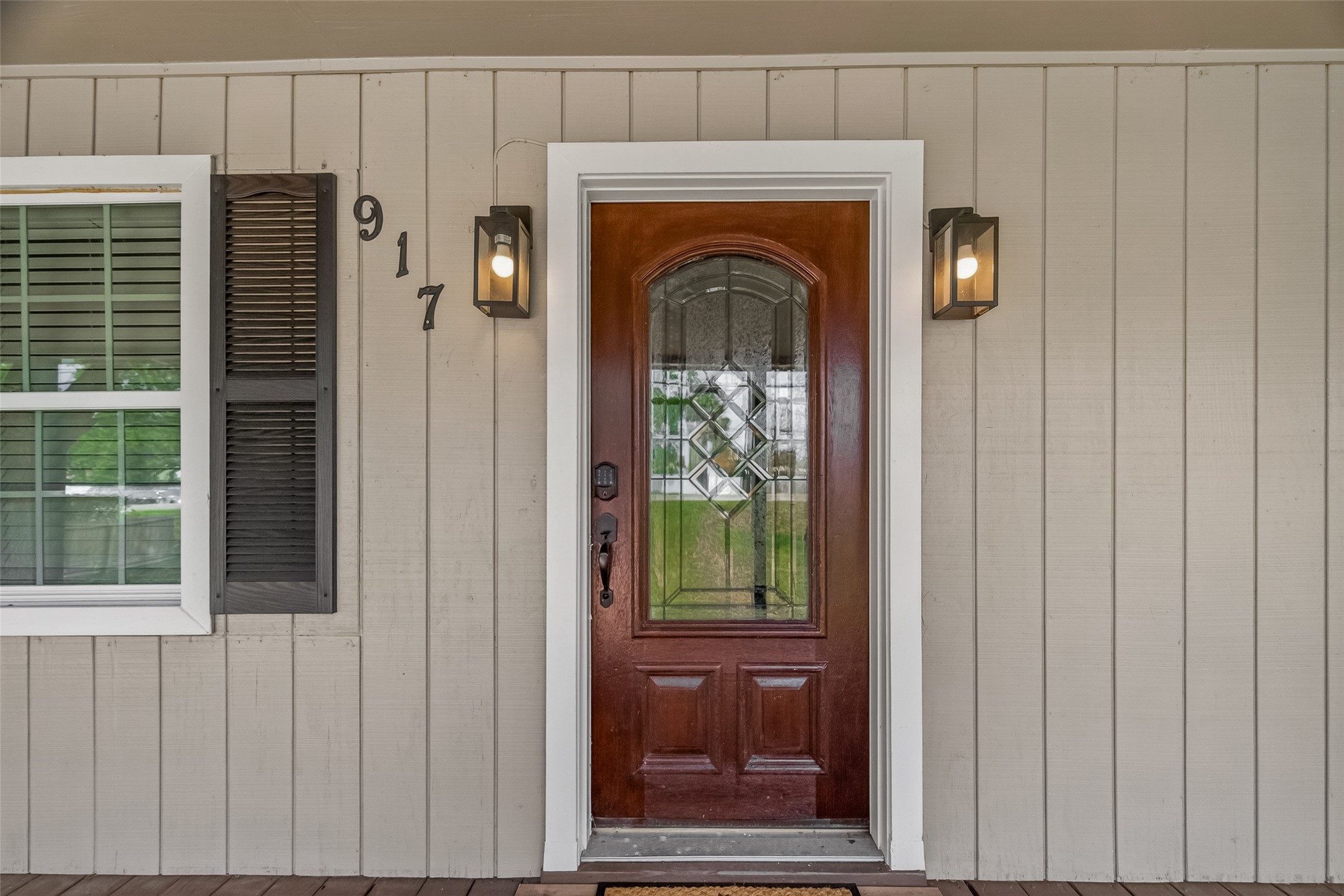 917 South Main Street Highlands, TX 77562 - Photo 3 of 45 a front view of a house with a door