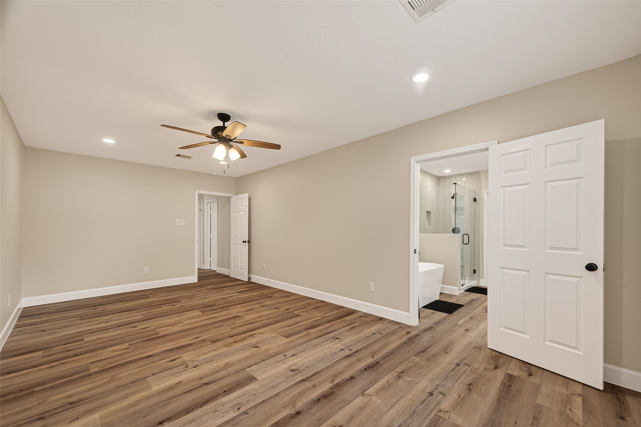 917 South Main Street Highlands, TX 77562 - Photo 32 of 45 wooden floor in an empty room with a window