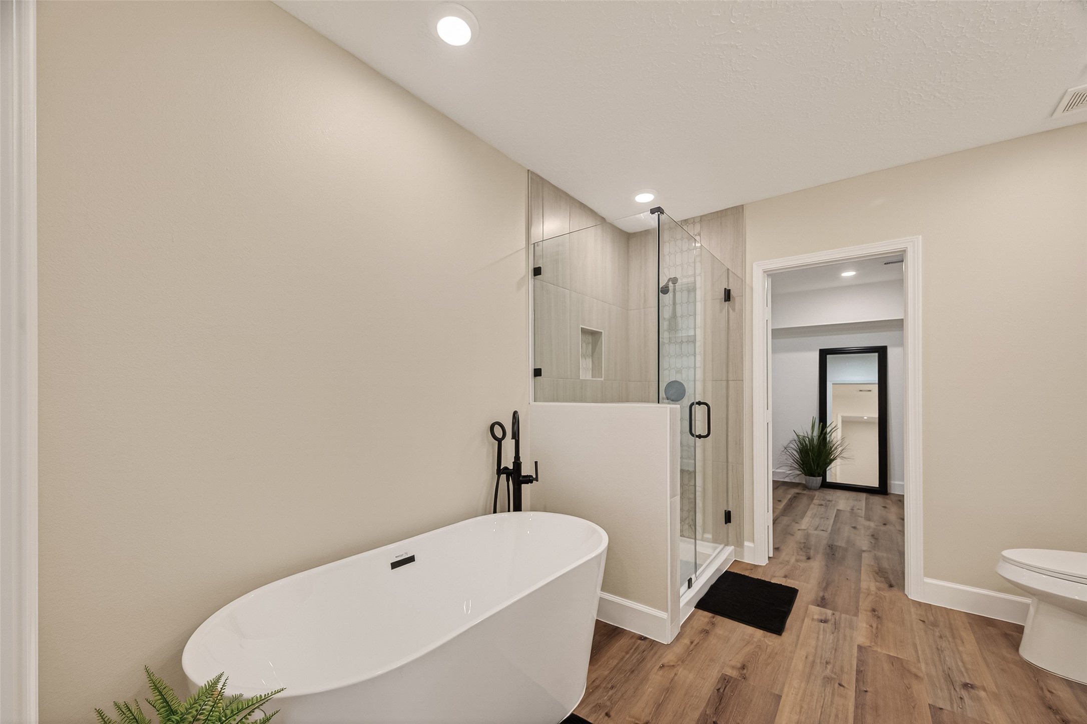 917 South Main Street Highlands, TX 77562 - Photo 33 of 45 a bathroom with a sink a toilet and shower