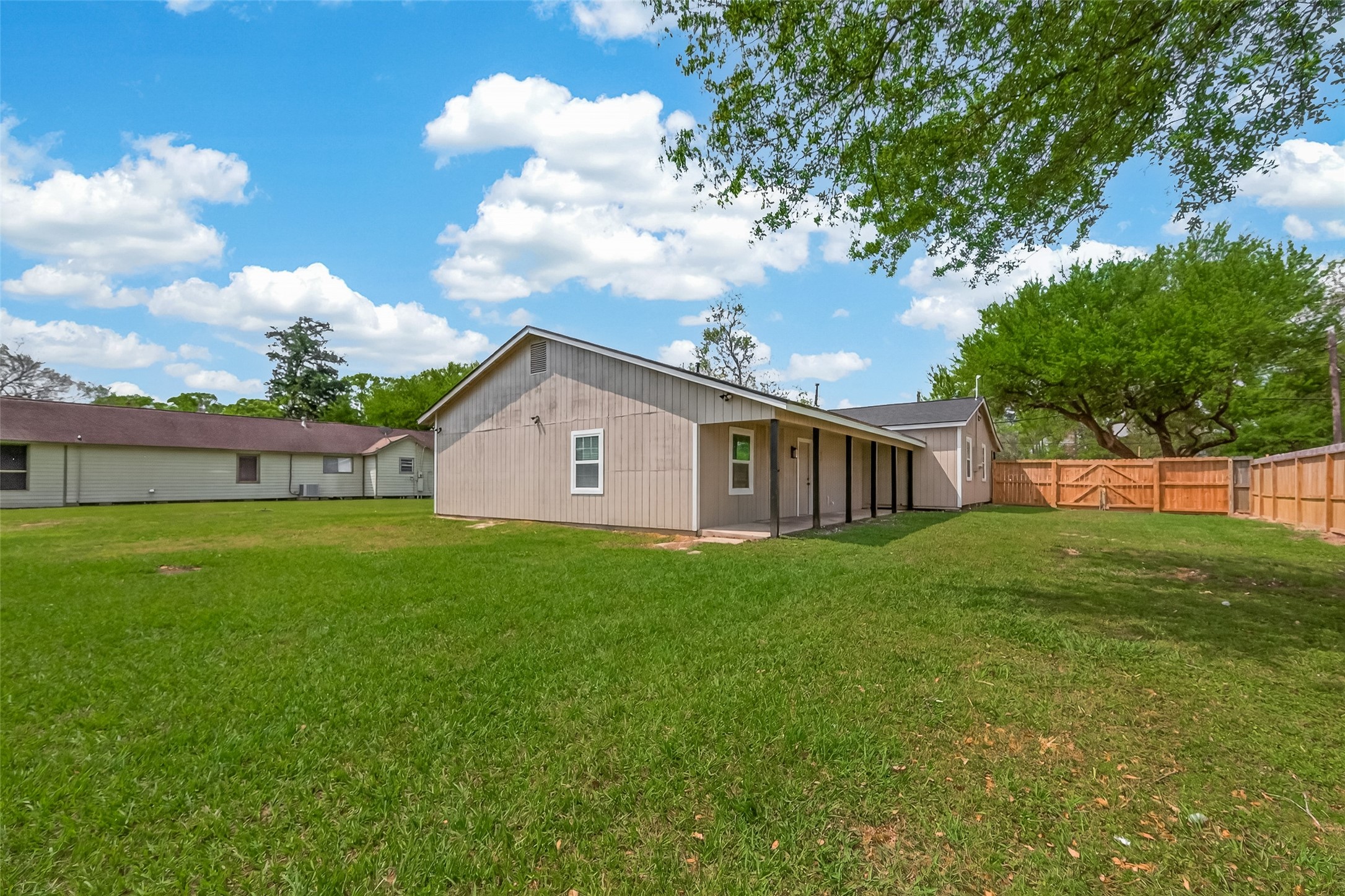 917 South Main Street Highlands, TX 77562 - Photo 39 of 45 a view of a house with backyard and garden