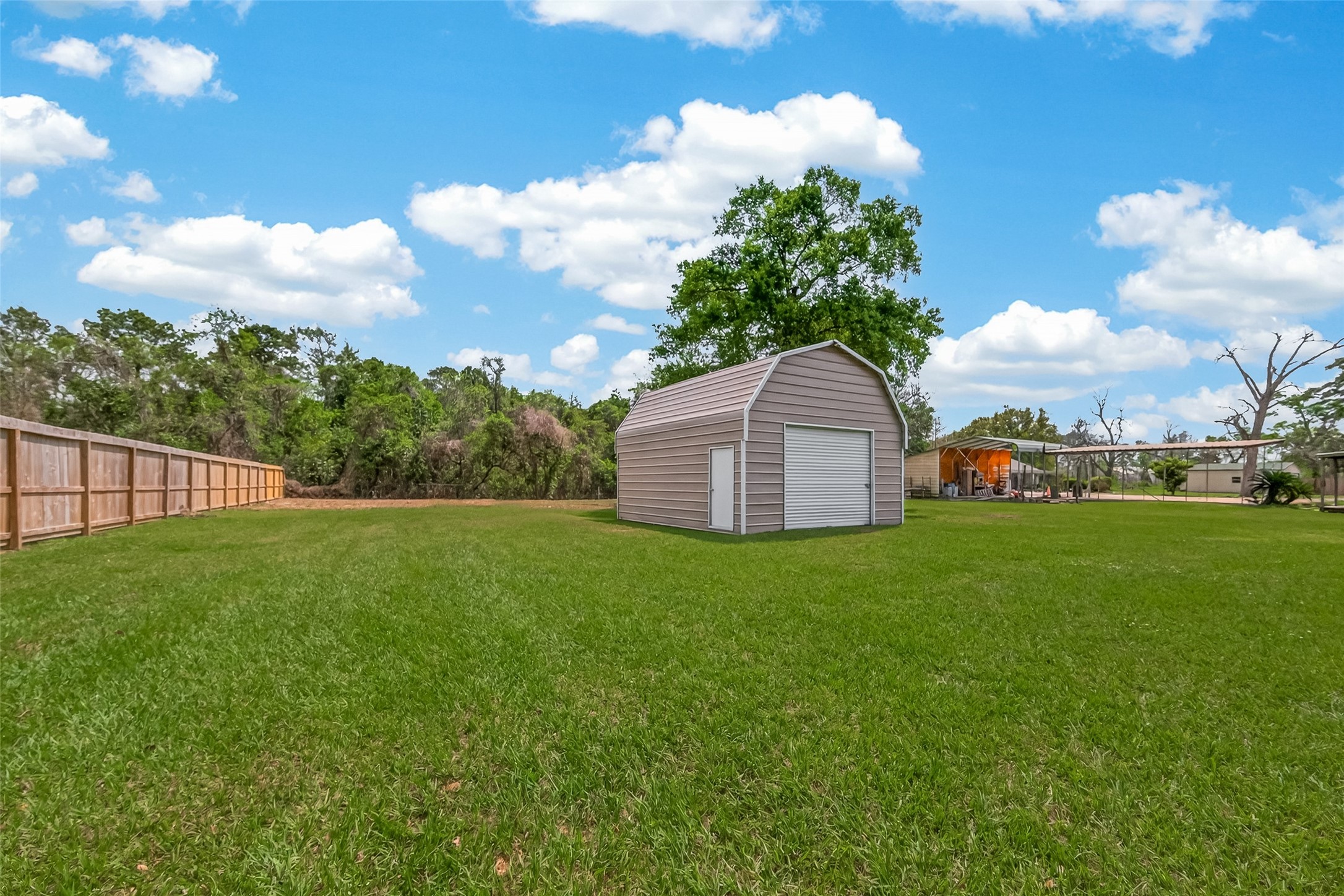 917 South Main Street Highlands, TX 77562 - Photo 40 of 45 a view of a garden with a houses