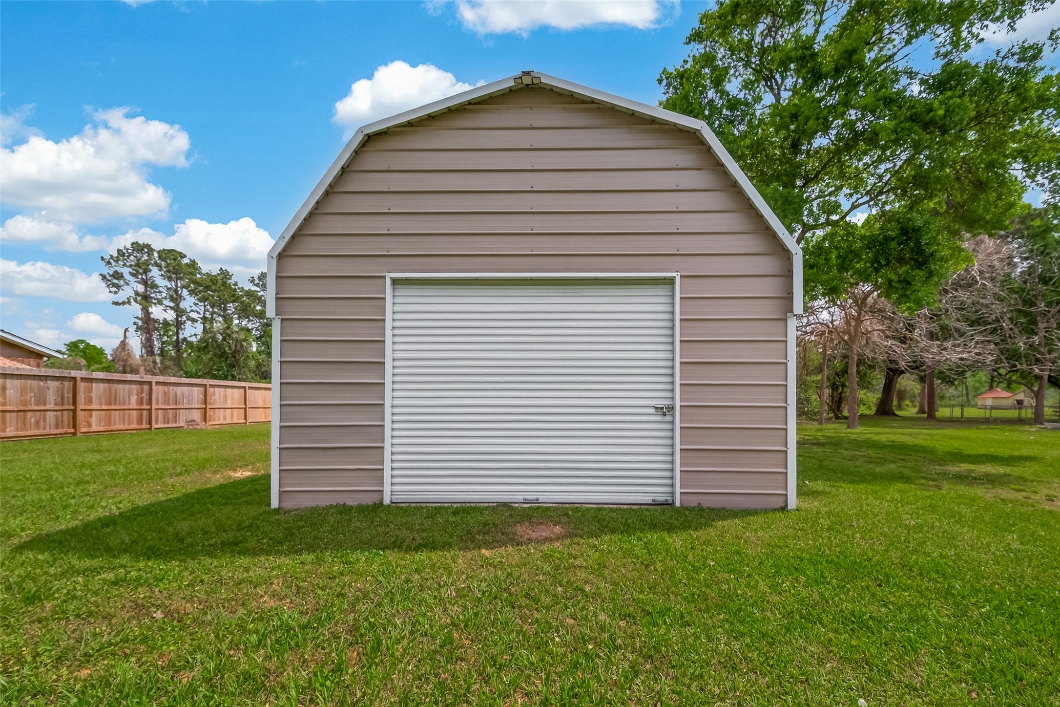 917 South Main Street Highlands, TX 77562 - Photo 42 of 45 a view of a backyard with wooden fence
