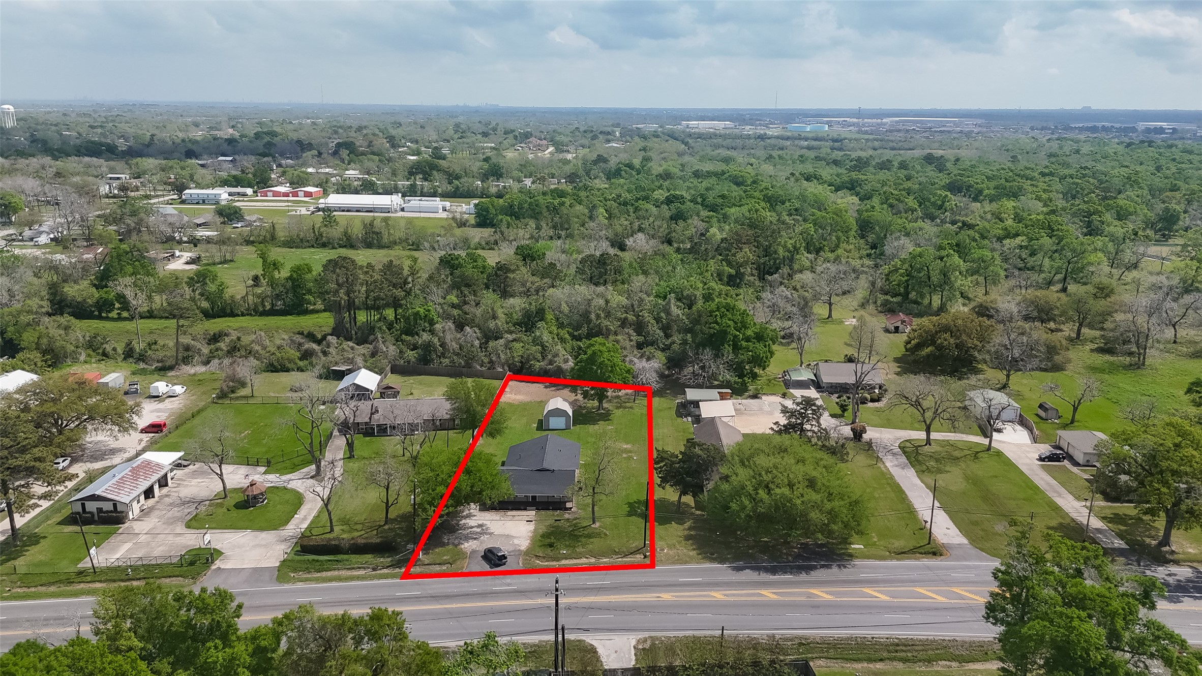 917 South Main Street Highlands, TX 77562 - Photo 44 of 45 an aerial view of a houses with a yard