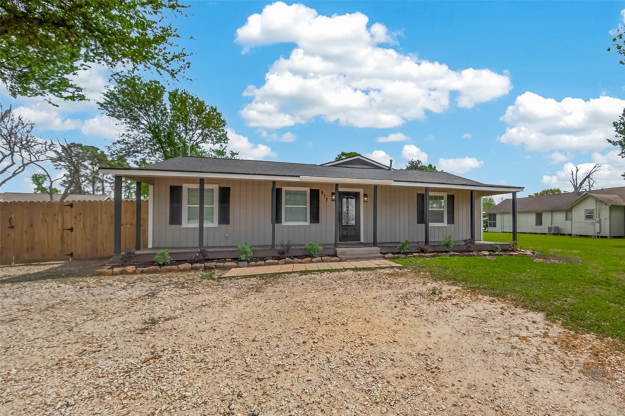 917 South Main Street Highlands, TX 77562 - Photo 45 of 45 a front view of a house with a garden