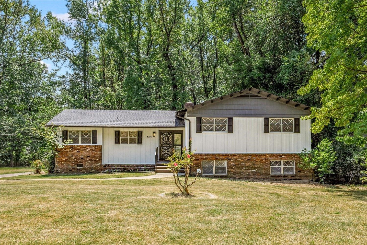a house view with a garden space