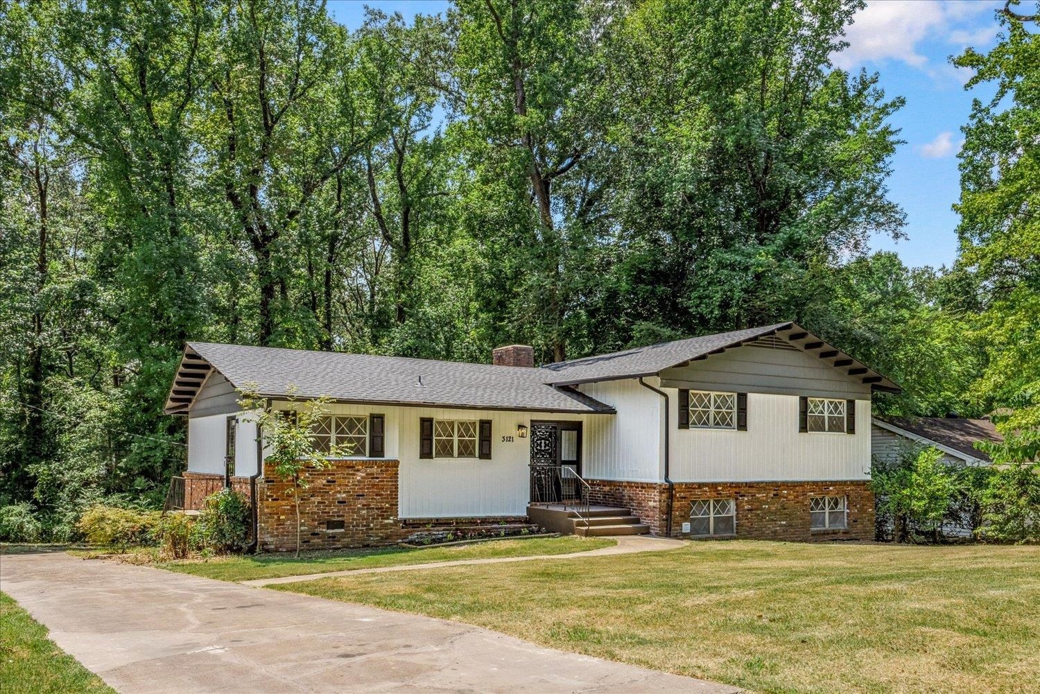 3121 East Glengarry Road Memphis, TN 38128 - Photo 2 of 15 a view of a house with a yard