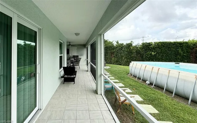 a view of a garden with balcony