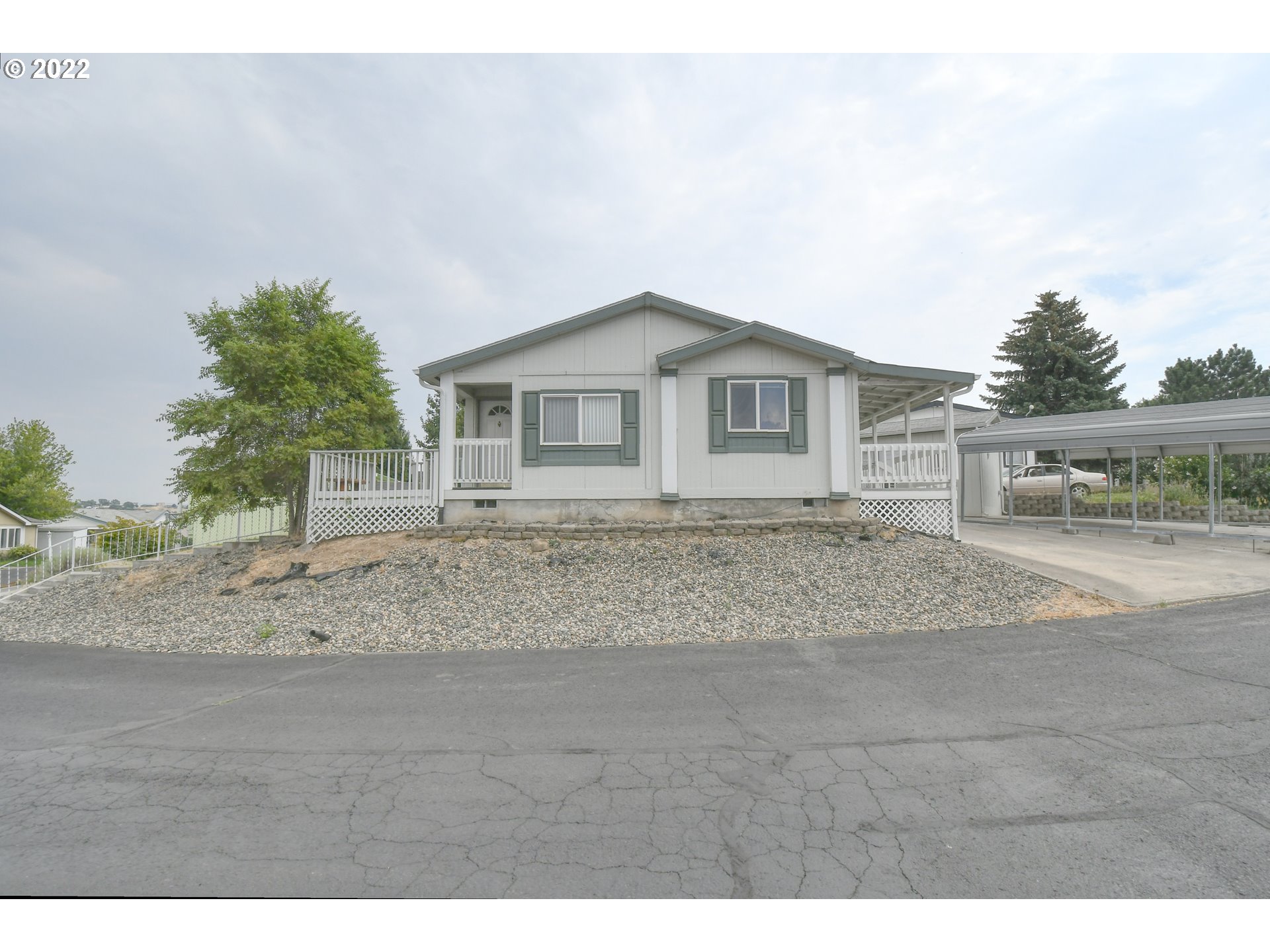 2600 Southwest Goodwin Avenue, Unit 33 Pendleton, OR 97801 - Photo 1 of 29 a house with a outdoor space
