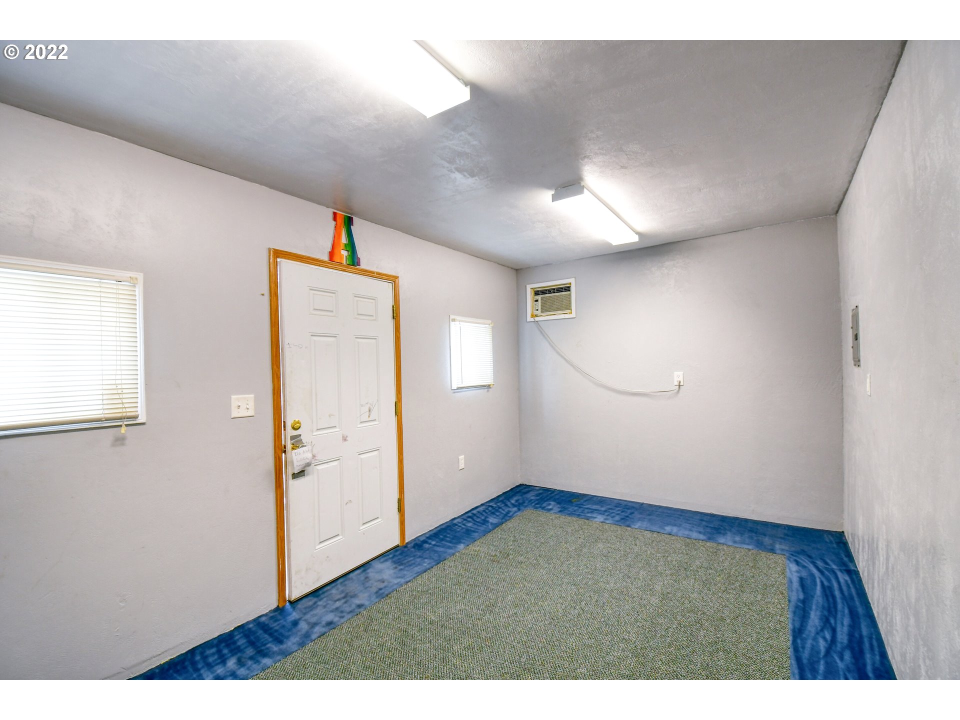 2600 Southwest Goodwin Avenue, Unit 33 Pendleton, OR 97801 - Photo 27 of 29 a view of empty room with wooden floor