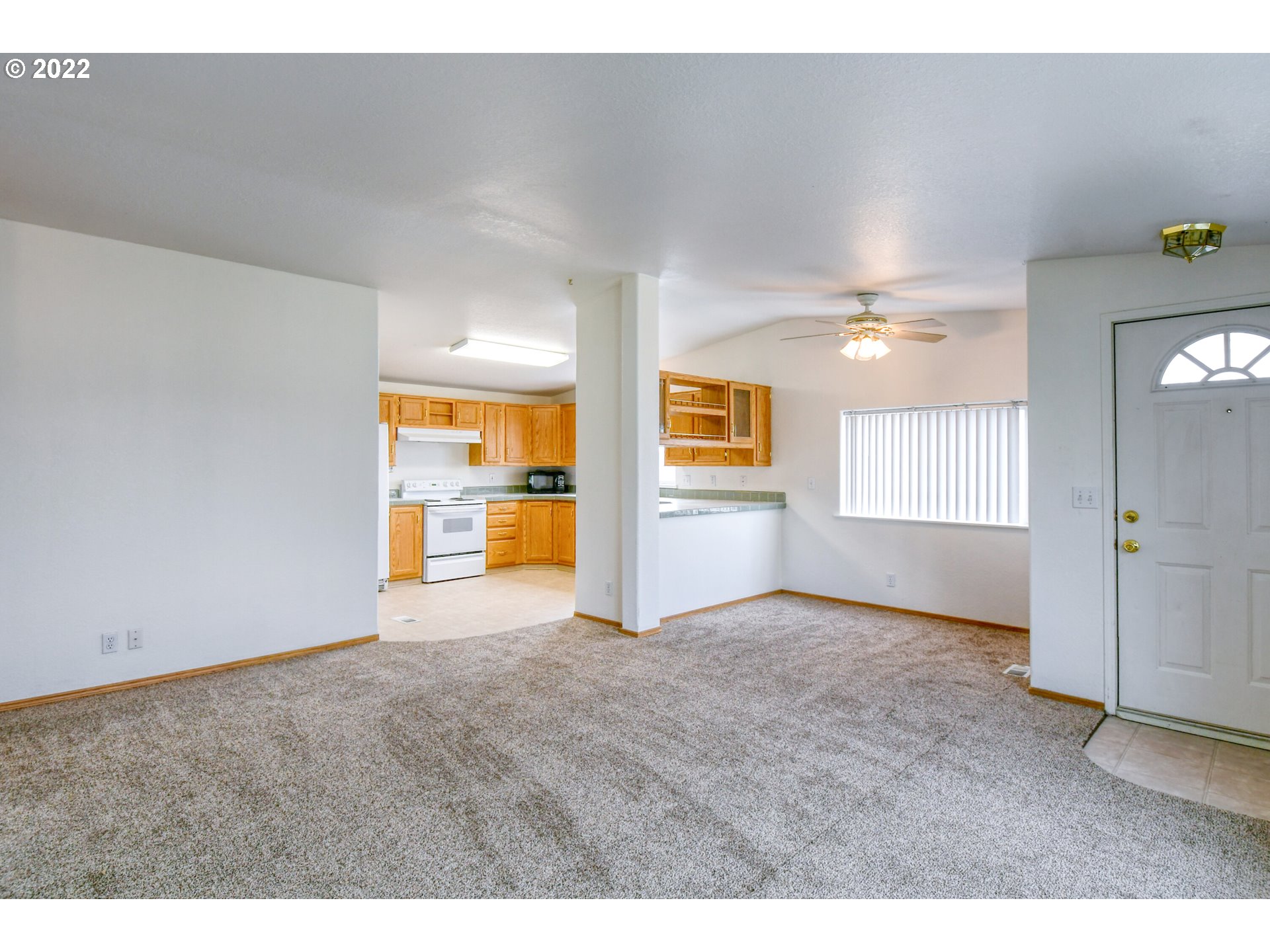 2600 Southwest Goodwin Avenue, Unit 33 Pendleton, OR 97801 - Photo 9 of 29 a view of an empty room with a window