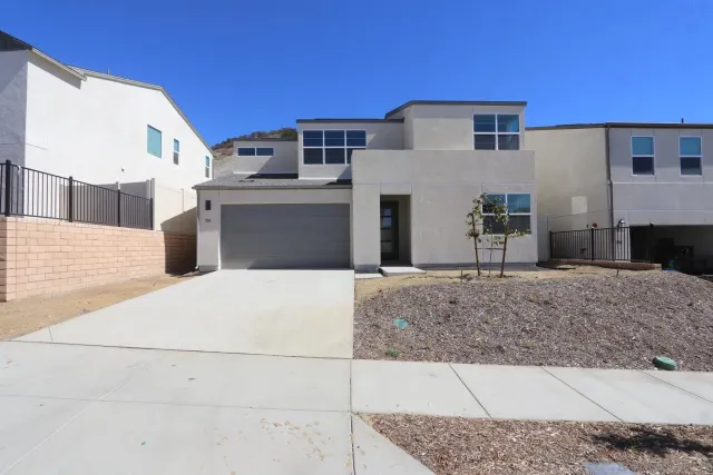a front view of a house with entertaining space