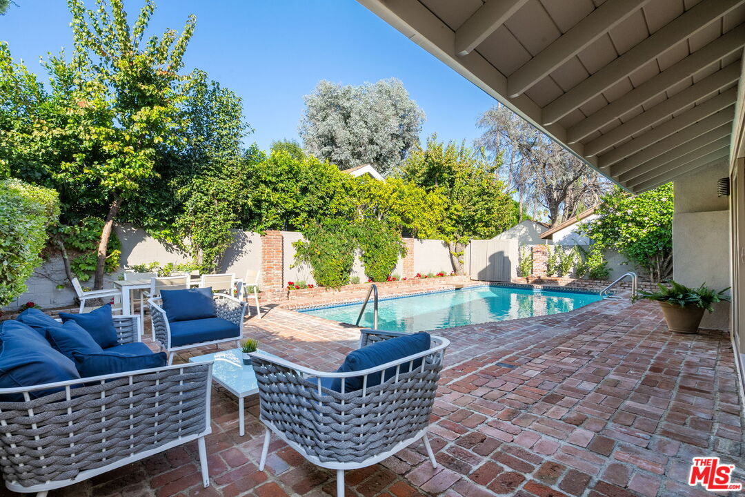 15115 Gilmore Street Van Nuys, CA 91411 - Photo 26 of 26 a view of outdoor sitting area with furniture